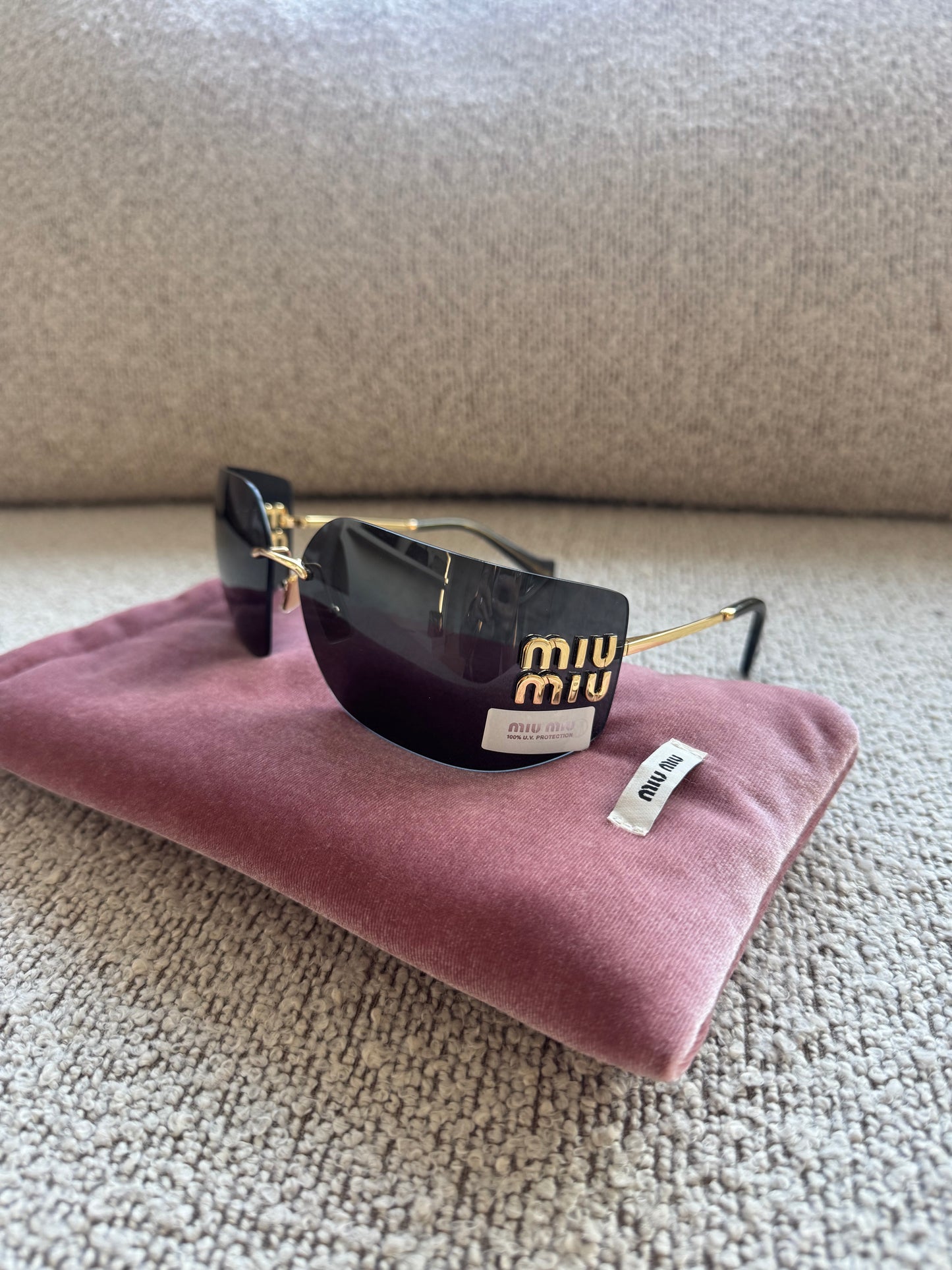 Miu Miu Shield Sunglasses – Gold Detail