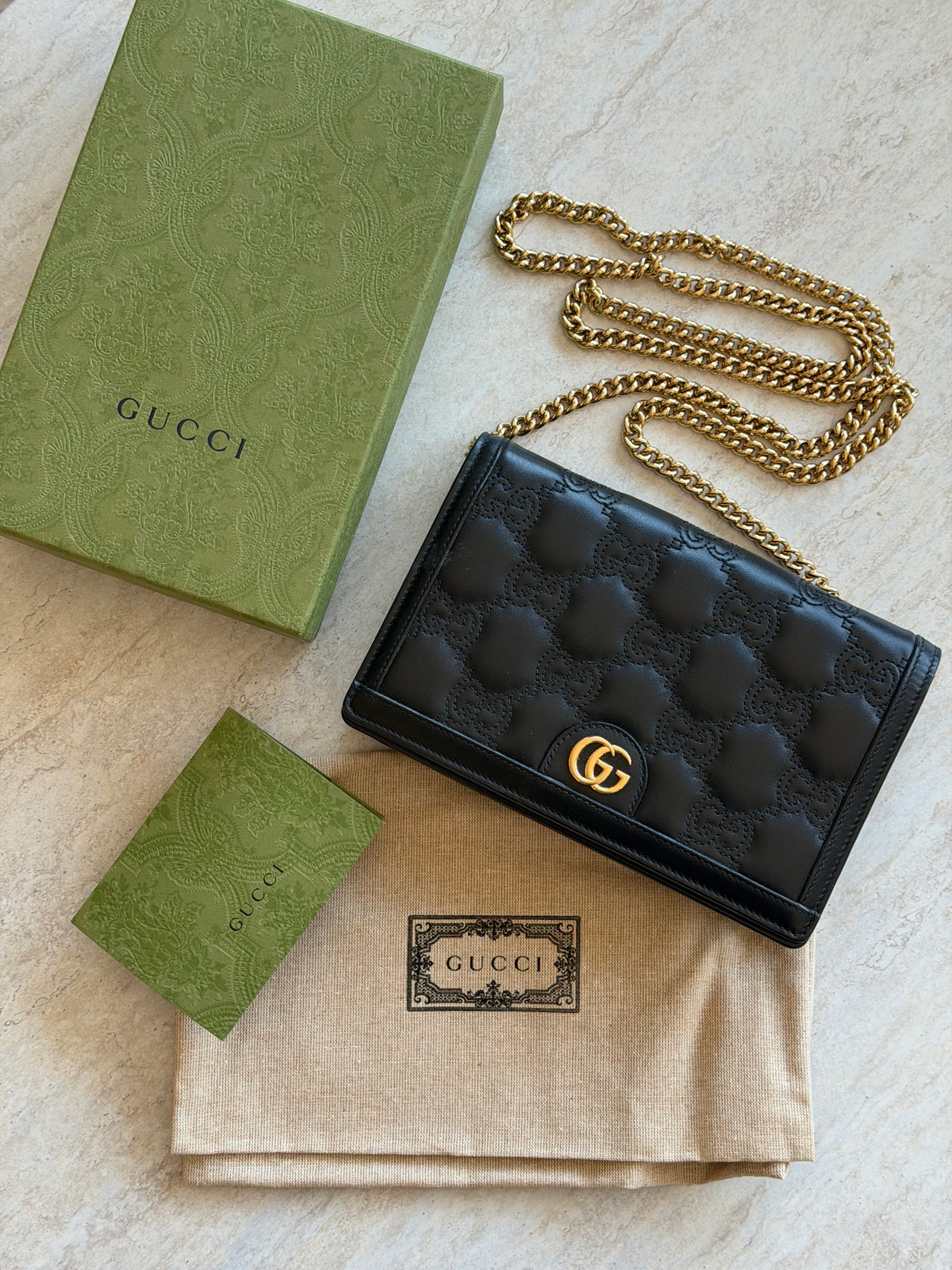 Gucci GG Matelassé Leather Chain Wallet – Black